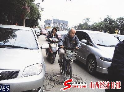 自行车道为啥被“瘦身”